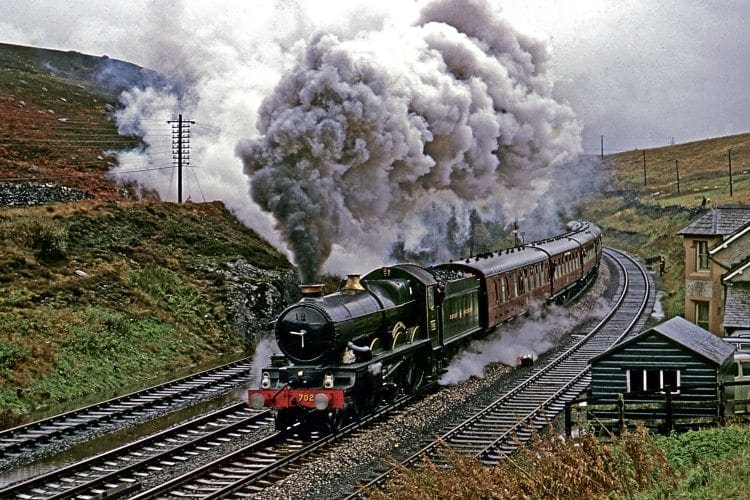 GWR 4-6-0 No. 7029 Clun Castle tops Shap summit with the LCGB ‘Castle to Carlisle’ tour on October 14 1967. TREVOR OWEN COLOUR-RAIL.COM 122352