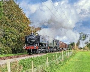 GWR Pannier Tank No. 9466 double heads with 7903 Foremarke Hall on a test run on the GWSR to Cheltenham Racecourse.