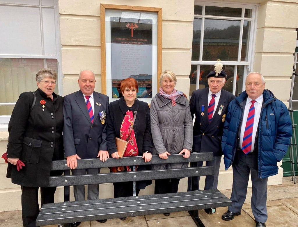 Attending members of the event pictured with Sian Gwenllian AM in front of the memorial.