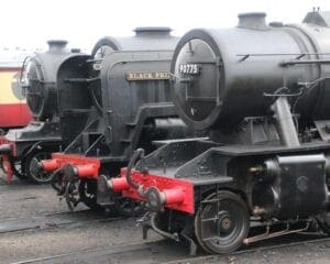 The North Norfolk Railway is among the lines returning to action in July. LNER B12 No. 8572, BR 9F No. 92203 Black Prince and WD 2-10-0 No. 90775 are seen outside Weybourne shed on September 28, 2019: GARETH EVANS