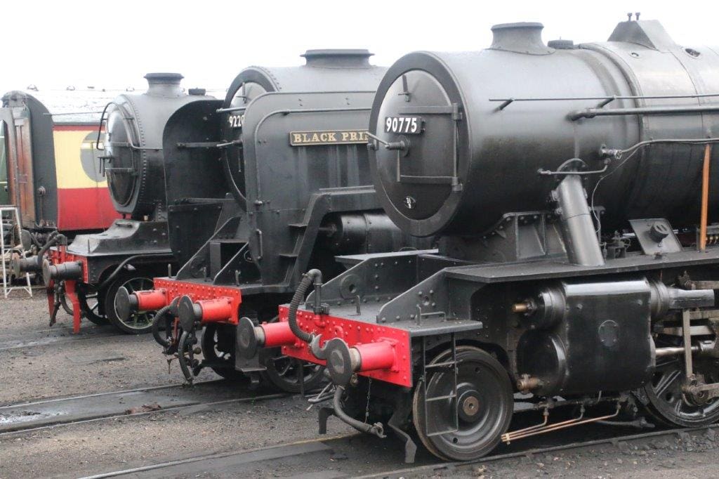 The North Norfolk Railway is among the lines returning to action in July. LNER B12 No. 8572, BR 9F No. 92203 Black Prince and WD 2-10-0 No. 90775 are seen outside Weybourne shed on September 28, 2019: GARETH EVANS