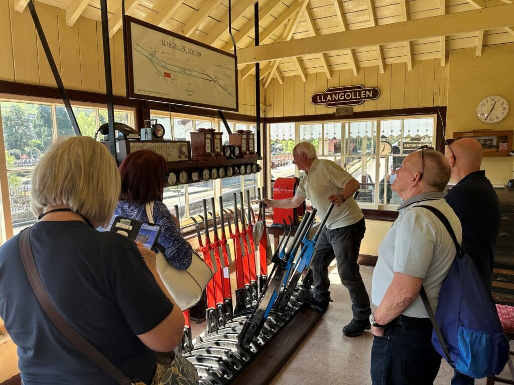 Participants in our Full-Day Steam Driver Experience get hands-on with traditional signalling, learning how to safely control train movements just like a real railway signalman.