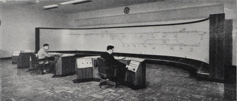 The 51 ft.-long mimic diagram in the Central Control Room of the Electric Traction Depot at Crewe. From the diagram all control of power feed for the Manchester-Crewe and Liverpool-Crewe electrification is effected.