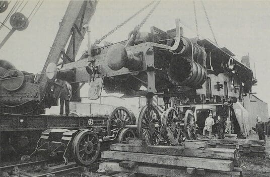 The B1’s frames are lifted carefully ready to be swung on to the wheelsets on an adjoining track at the Great Central Railway.
