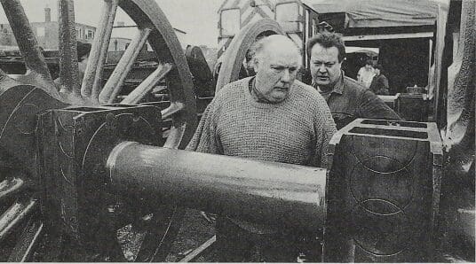 Great Central Railway Locomotive Superintendent Alûn Grice checks the final fitting of the axleboxes with Trust Chairman Mike Cobley prior to re-wheeling.